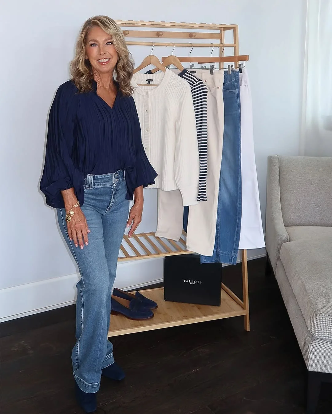 what to wear in fall 2026 over 50 Navy Blouse With Flared Denim and Soft Polish