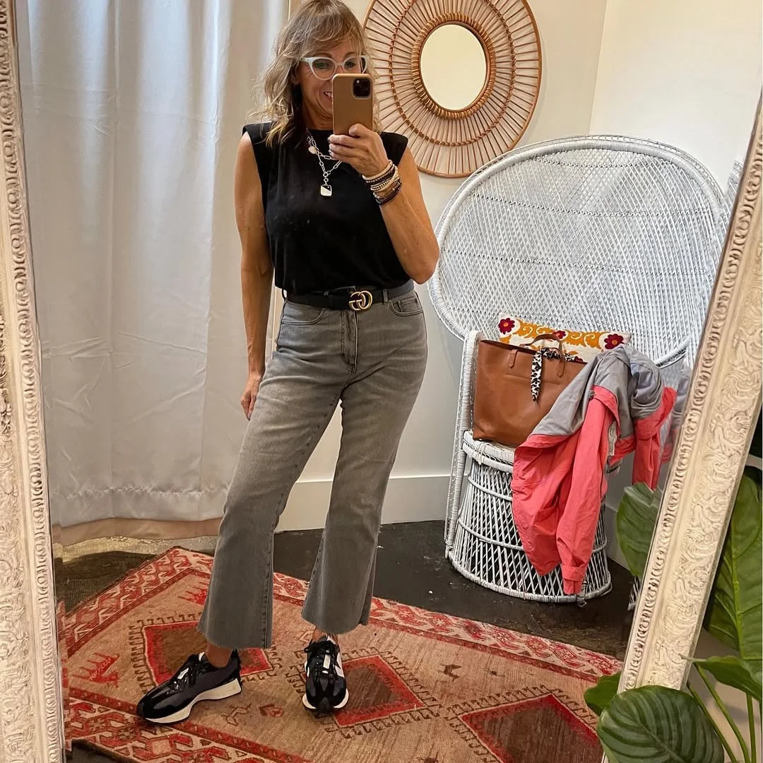 what to wear in fall 2026 over 50 Black Sleeveless Top With Cropped Gray Denim