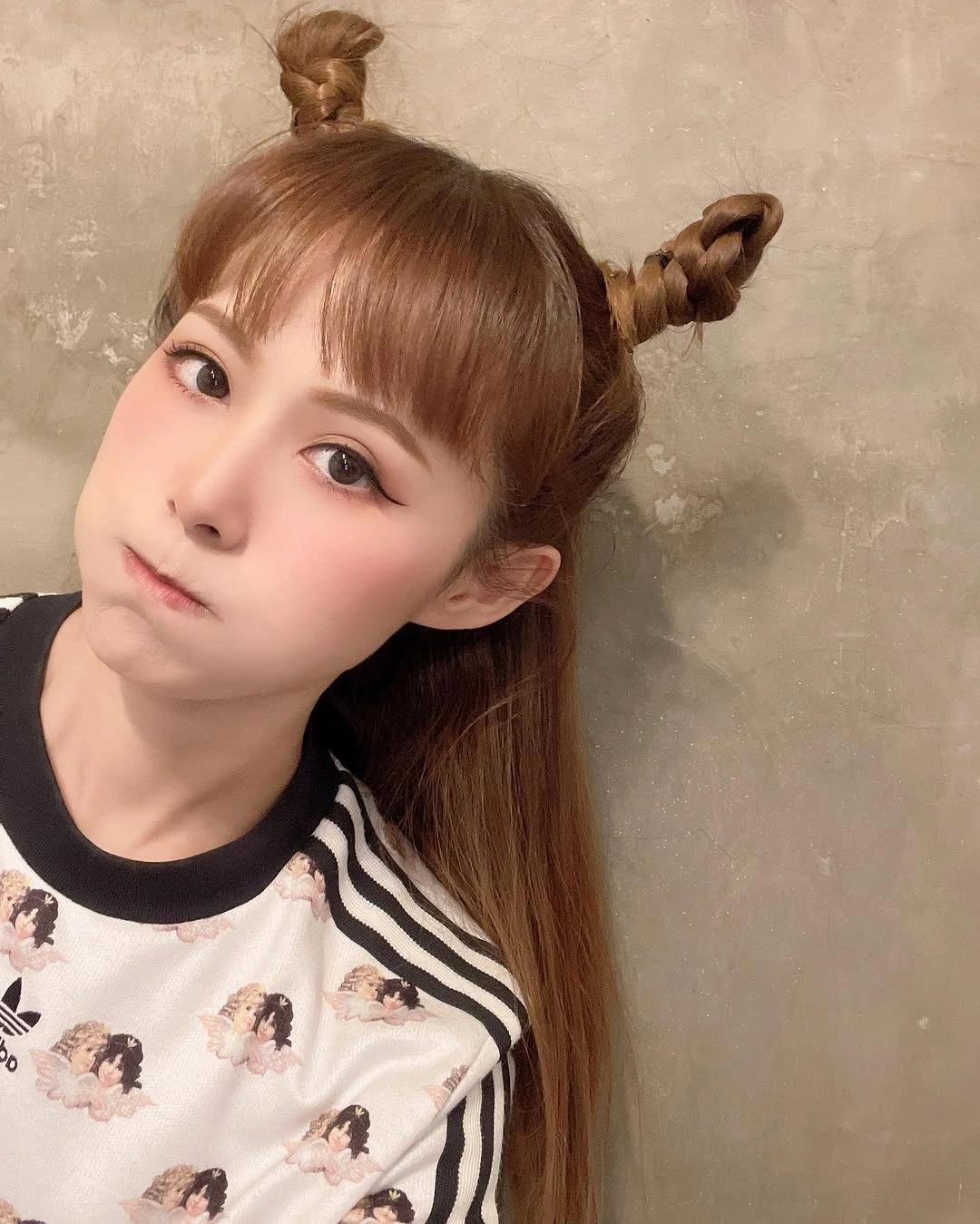 august hairstyles and color ideas 2026 + Twisted Space Buns With Soft Fringe