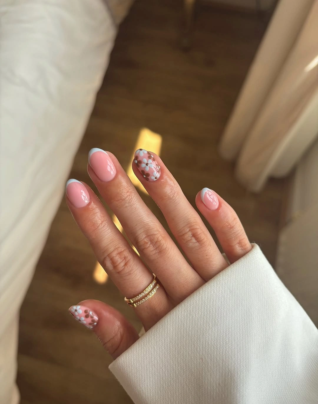 august nails color 2026 + Soft Pink French Nails With Cocoa Daisies