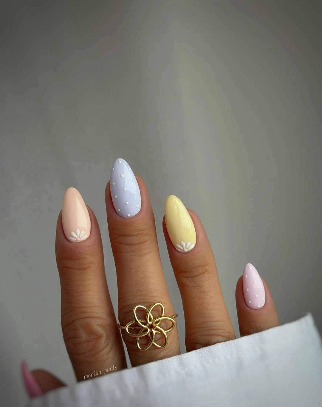 august nails ideas 2026 + Pastel Daisy Accent Nails in a Soft Almond Shape