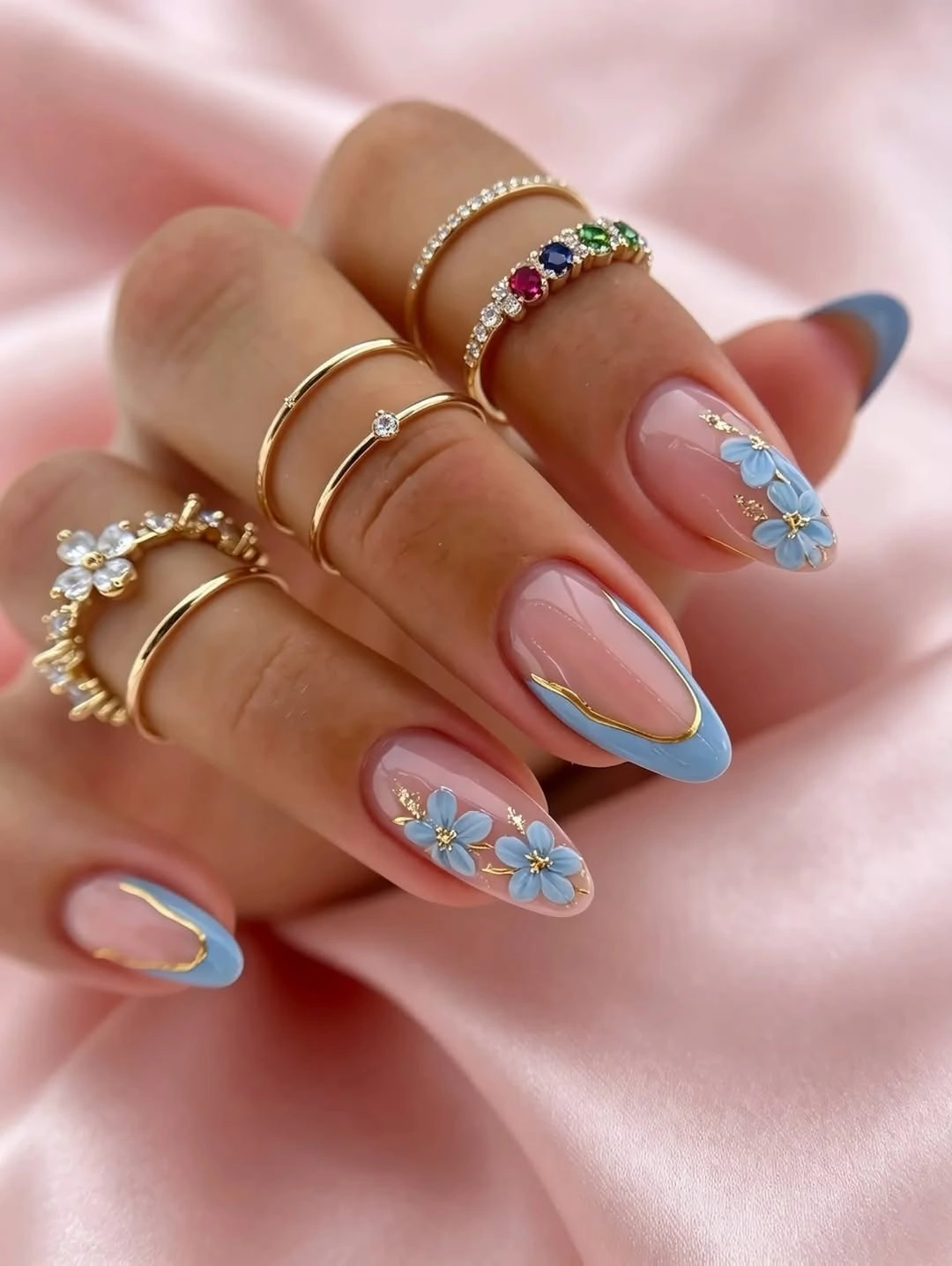august nails ideas 2026 + Powder Blue Floral French Tips With Gold Details