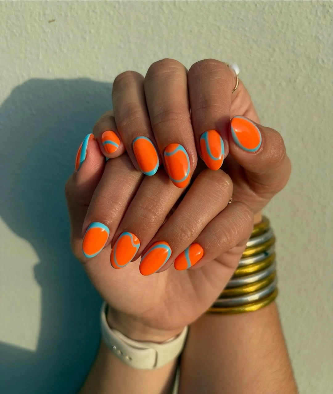 august nails ideas 2026 + Orange and Turquoise Waves for High-Summer Energy