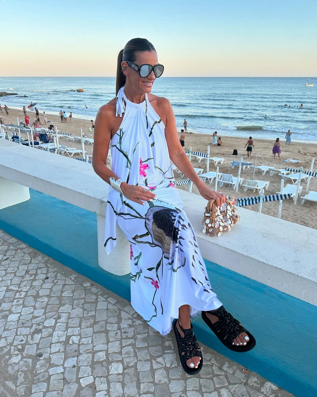 august outfits 2026 + White Halter Maxi Dress for a Seaside August Escape