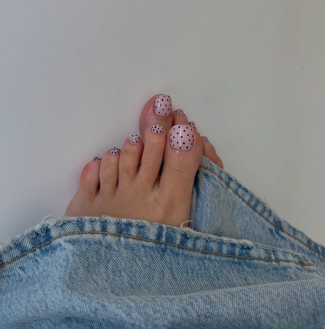 august pedicure nails ideas 2026 + Black Polka Dots on a Blush Pink Base
