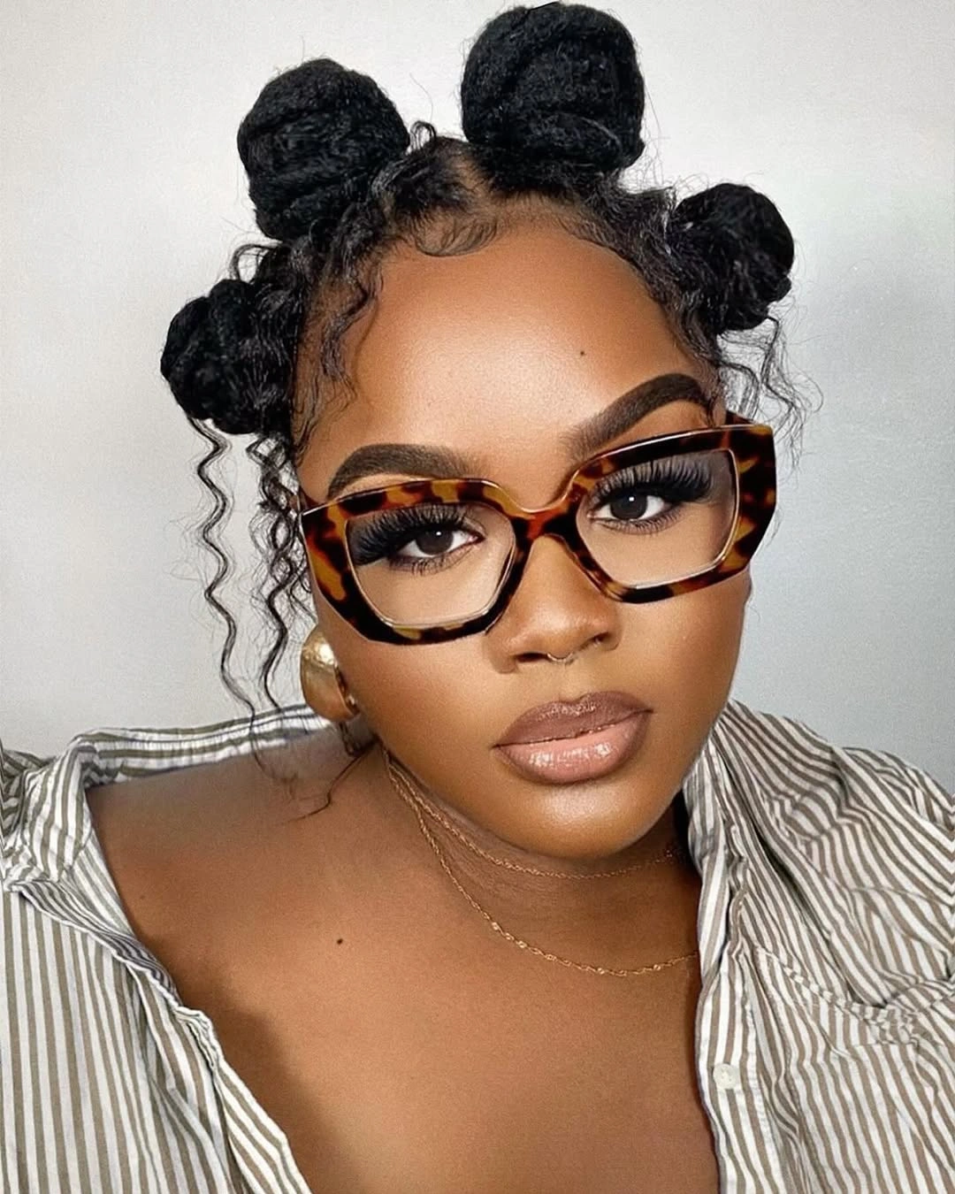 bantu knots hairstyles Soft Glam Knots With Statement Glasses