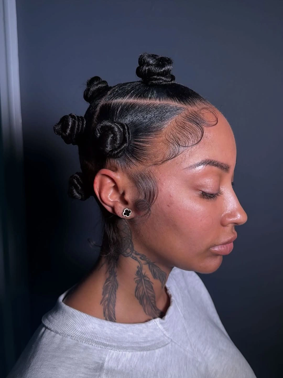 bantu knots hairstyles Slick Side Knots With Sculpted Edges