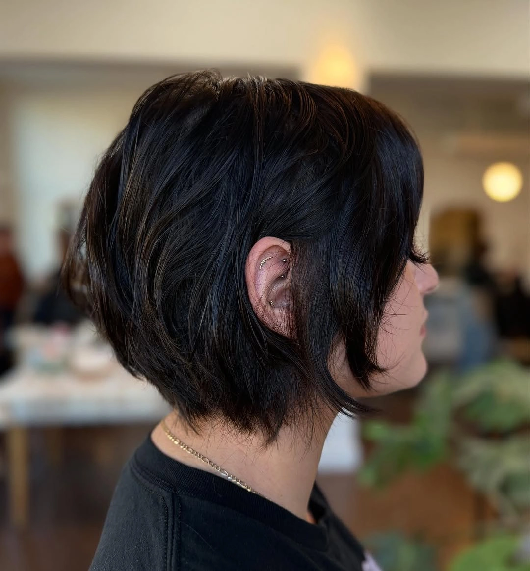 bixie haircut Sleek Black Bixie With a Feathered Side Panel