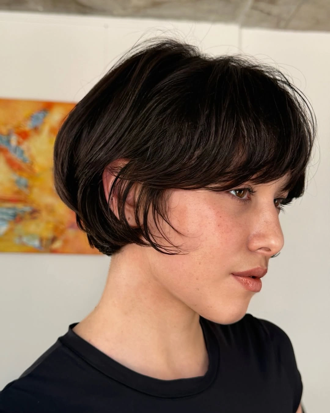bixie haircut Rounded Brunette Bixie With a Curved Fringe