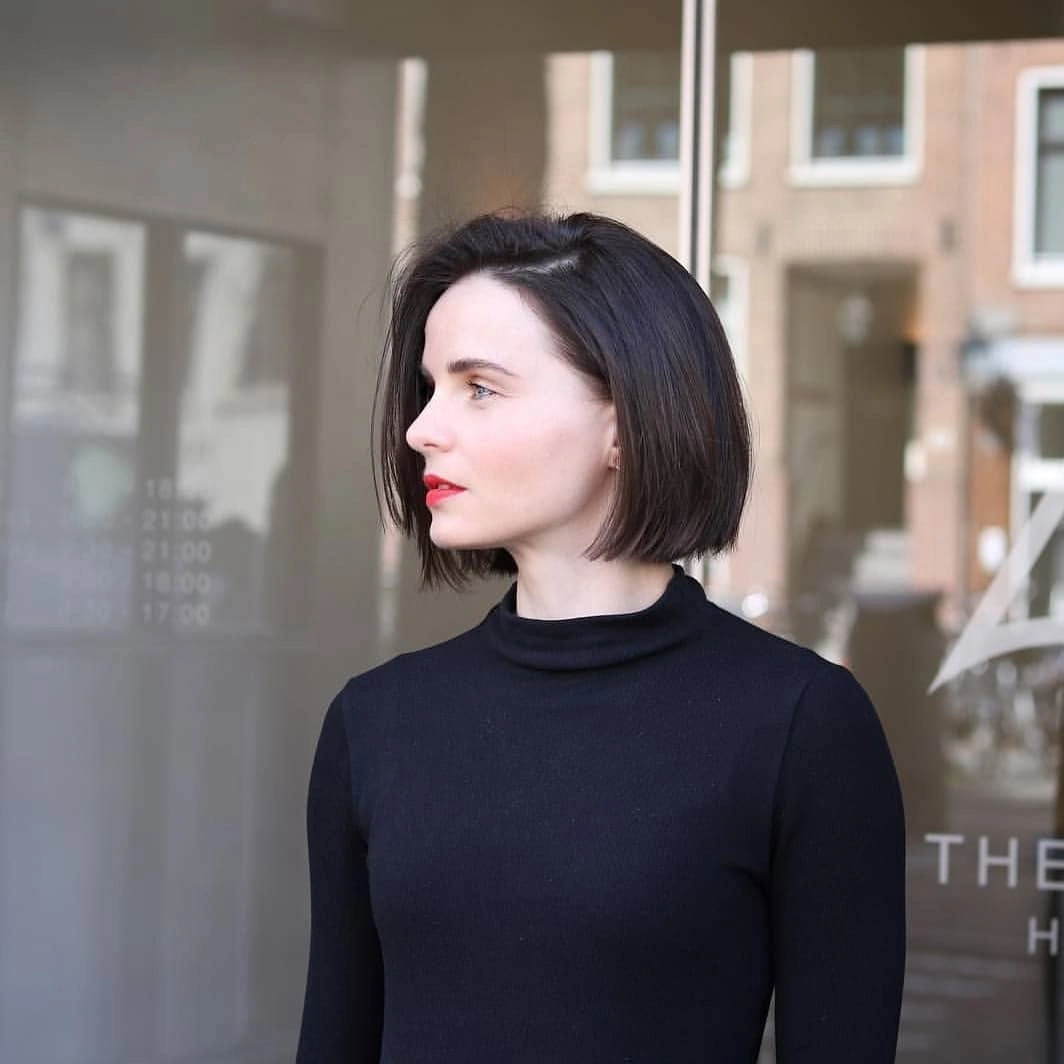 bobbed haircut for women Classic Dark Bob With Red Lip Energy