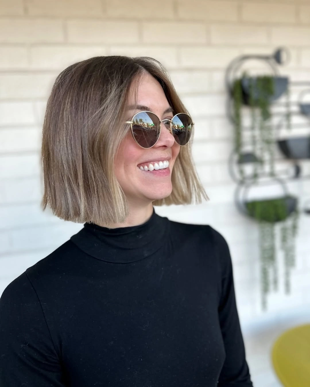 bobbed haircut for women Sunlit Lob Bob With Easy Sunglasses Styling