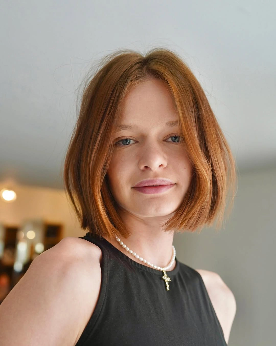 bobbed haircut for women Copper Bob With Soft Center-Part Drama
