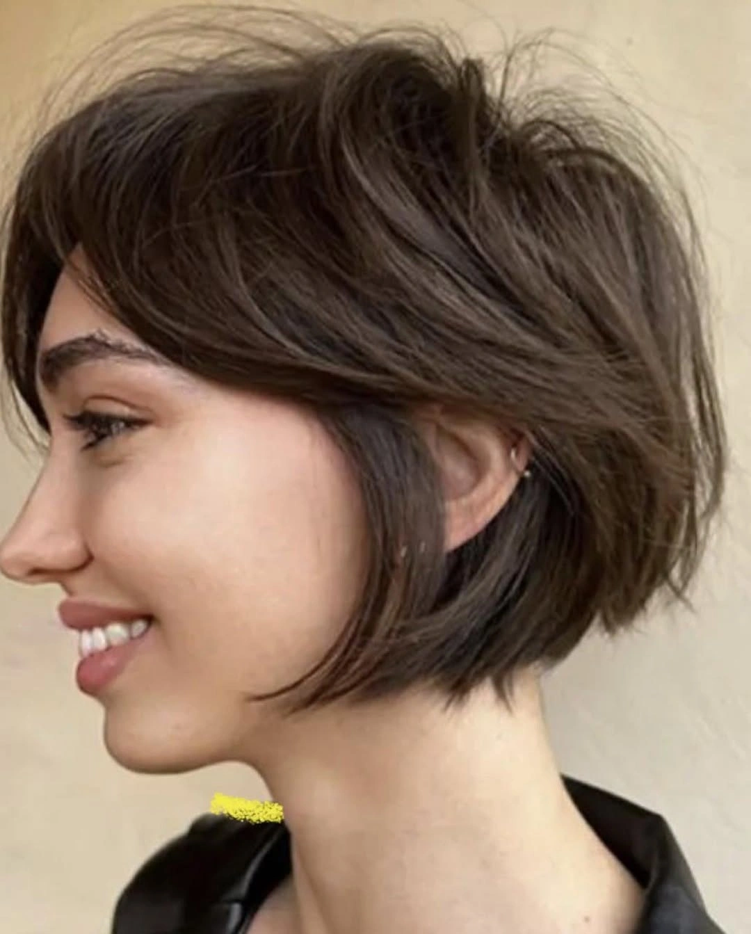 bobbed haircut for women Short Feathered Bob With Airy Layers