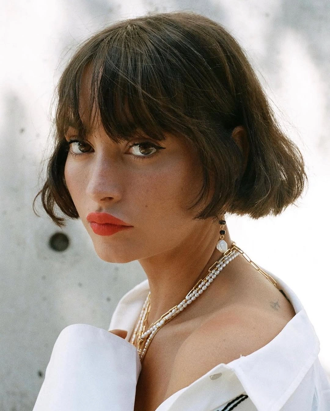 bobbed haircut for women Curly French Bob With Soft Fringe