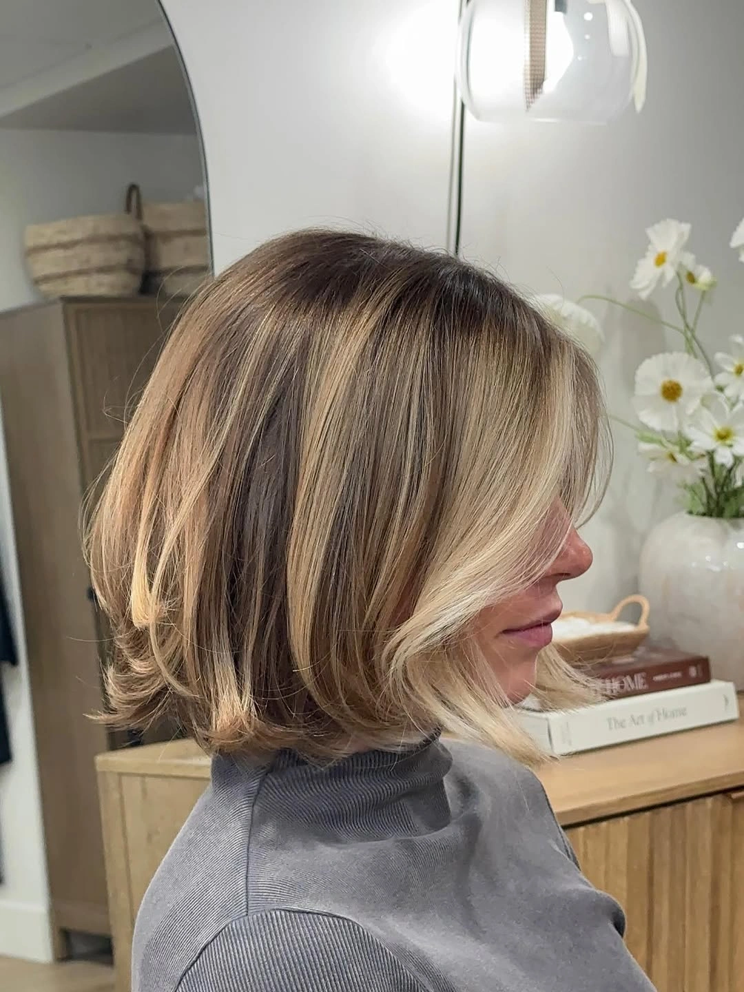 bobbed haircut for women Polished Blonde Bob With Face-Framing Swoop