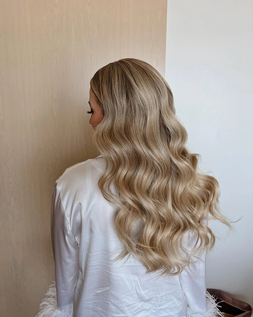 body waves hairstyle Pearl Blonde Waves With a Soft Silky Finish