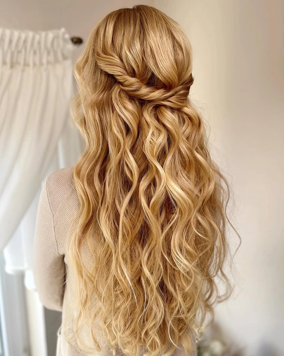 body waves hairstyle Golden Twisted Half-Up Waves With Airy Ends