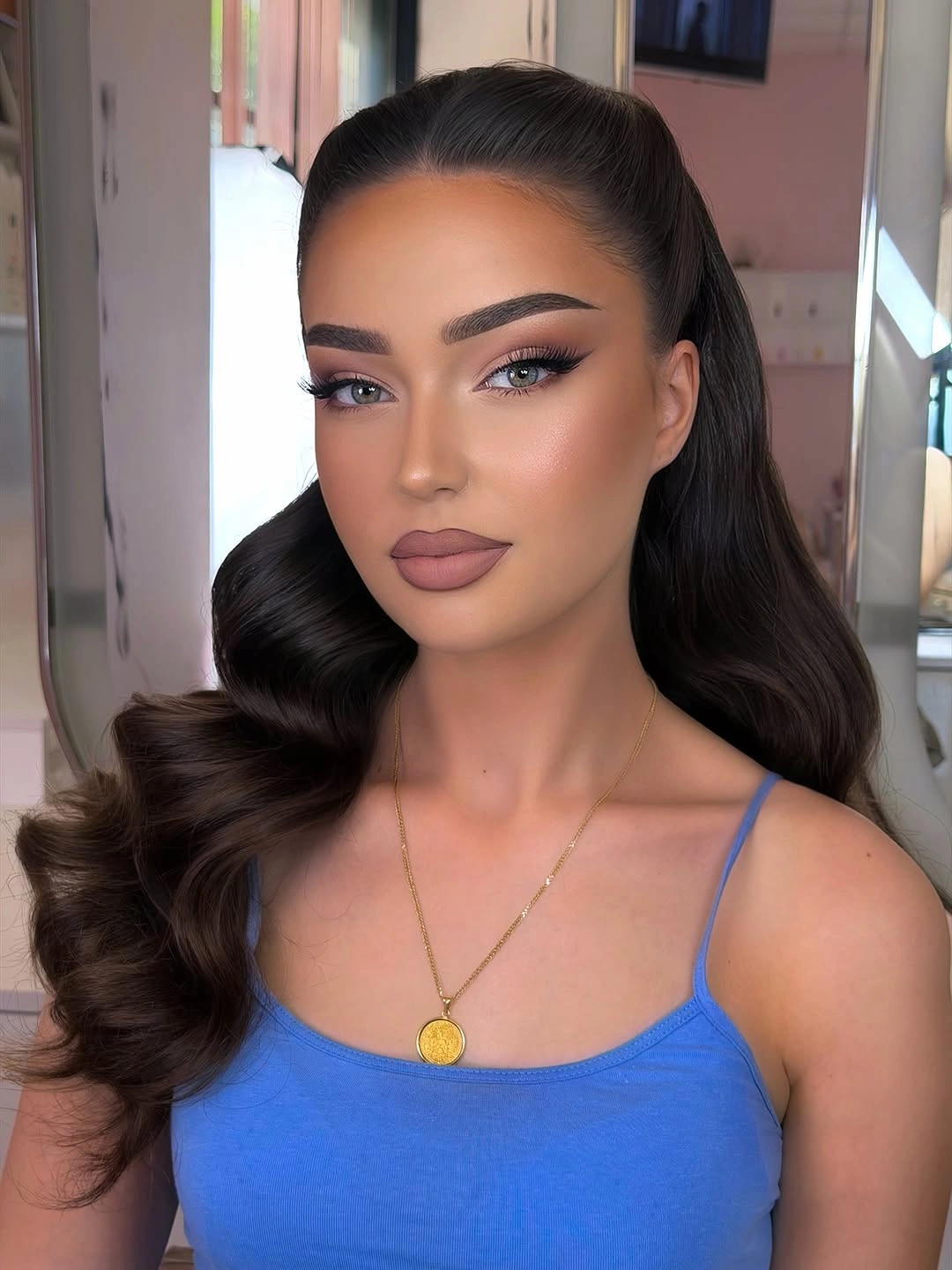 body waves hairstyle Slick Half-Up Waves Draped Over One Shoulder