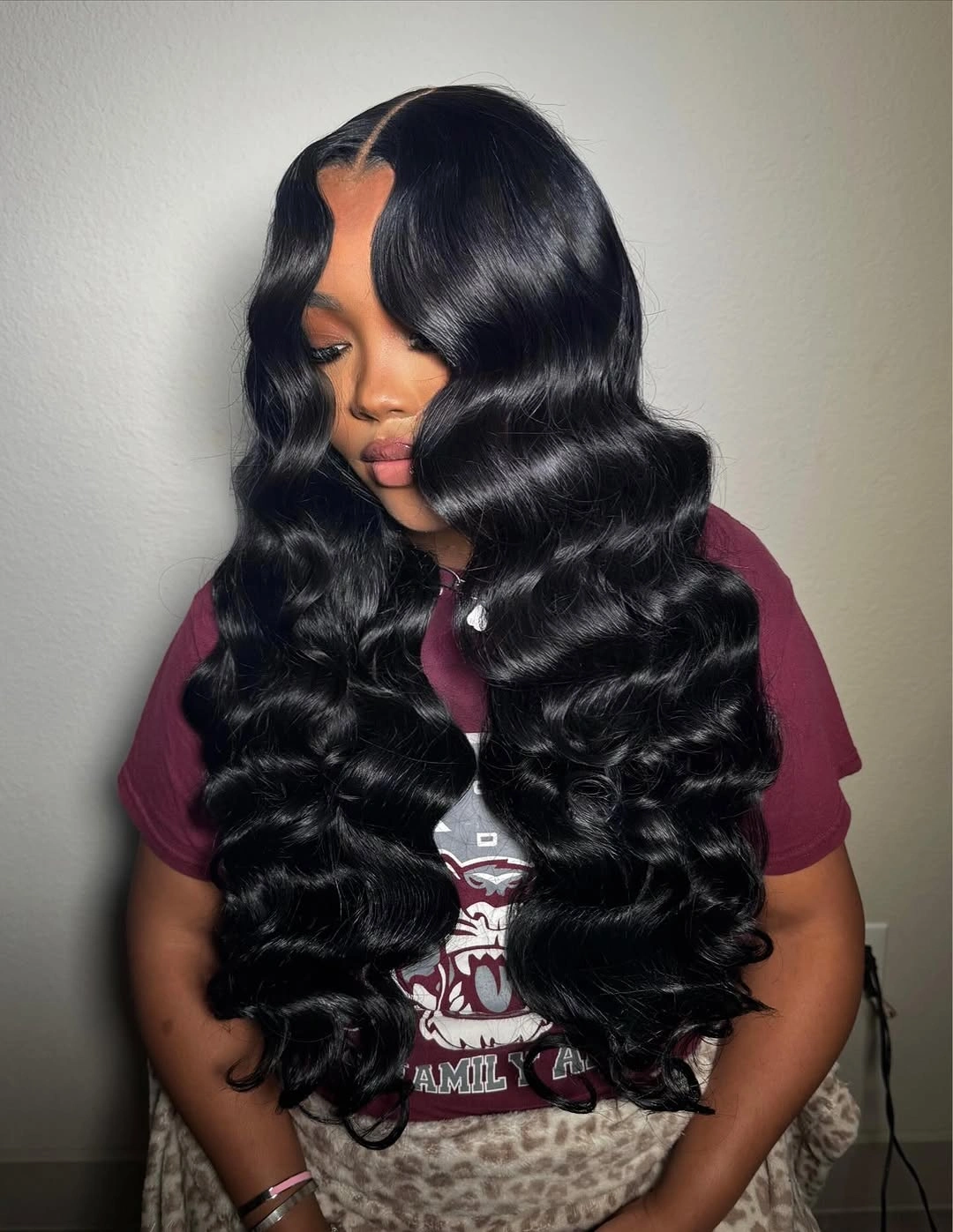 body waves hairstyle Waist-Length Black Waves With a Precise Center Part