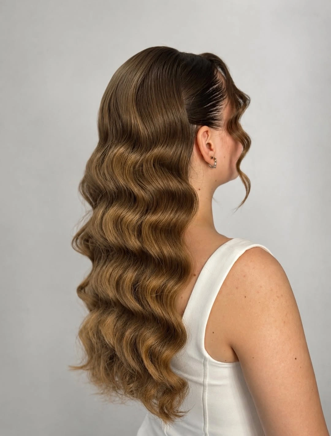 body waves hairstyle Caramel Waves Swept Into an Event-Ready Side