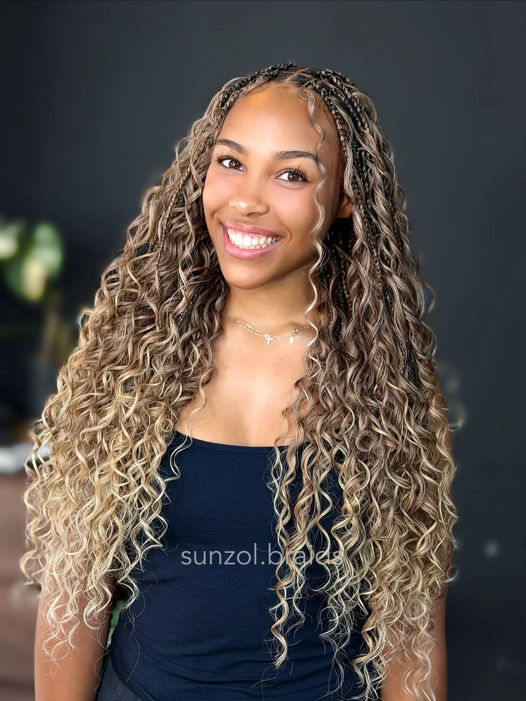 bora bora braids hairstyle Blonde Curls With Defined Braided Roots