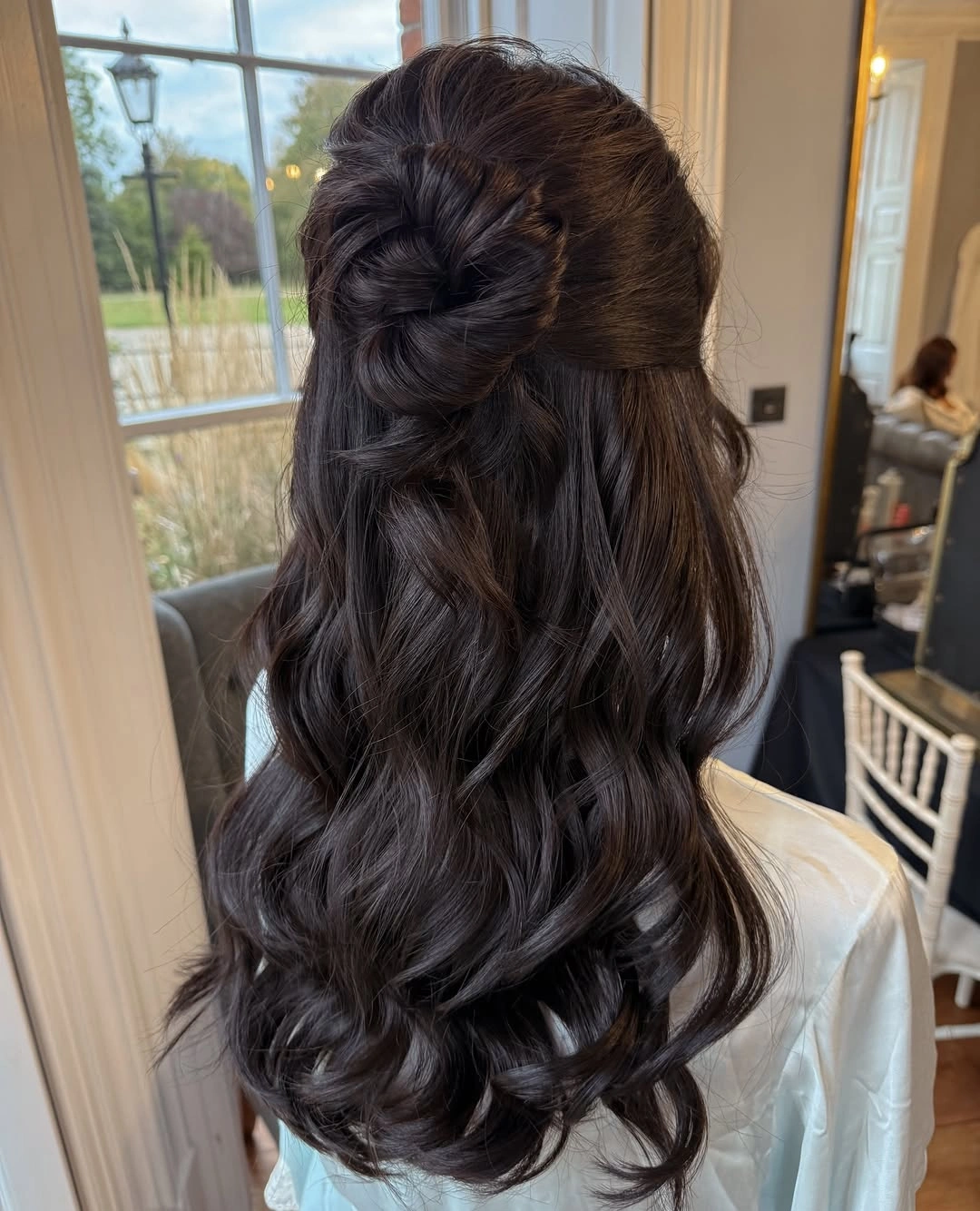 bridesmaid hairstyling Glossy Half-Up Rose Knot For Long Hair