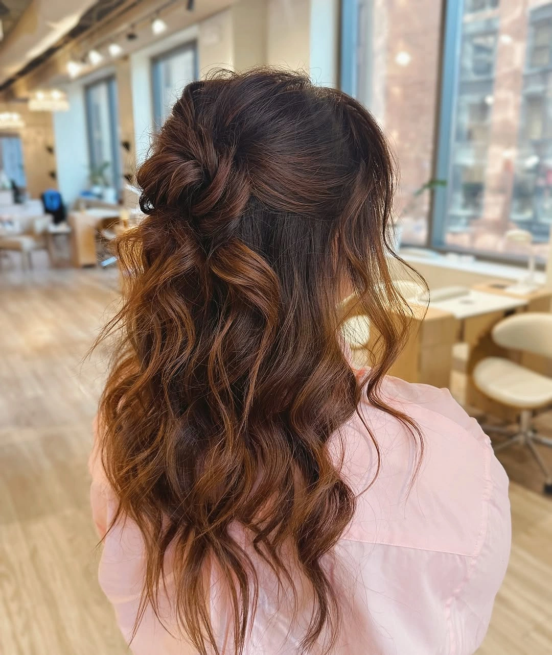 bridesmaid hairstyling Coppery Half-Up Bun With Salon Waves