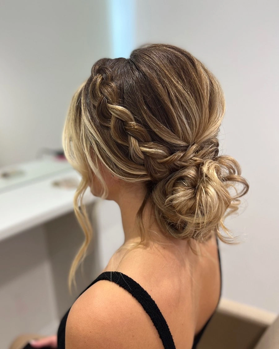 bridesmaid hairstyling Braided Low Bun For Soft Blonde Dimension