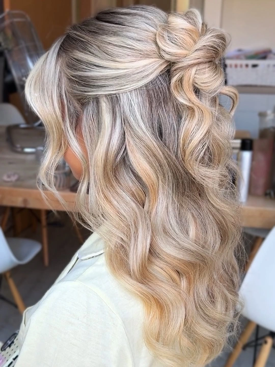 bridesmaid hairstyling Mini Half-Up Bun With Tousled Blonde Waves