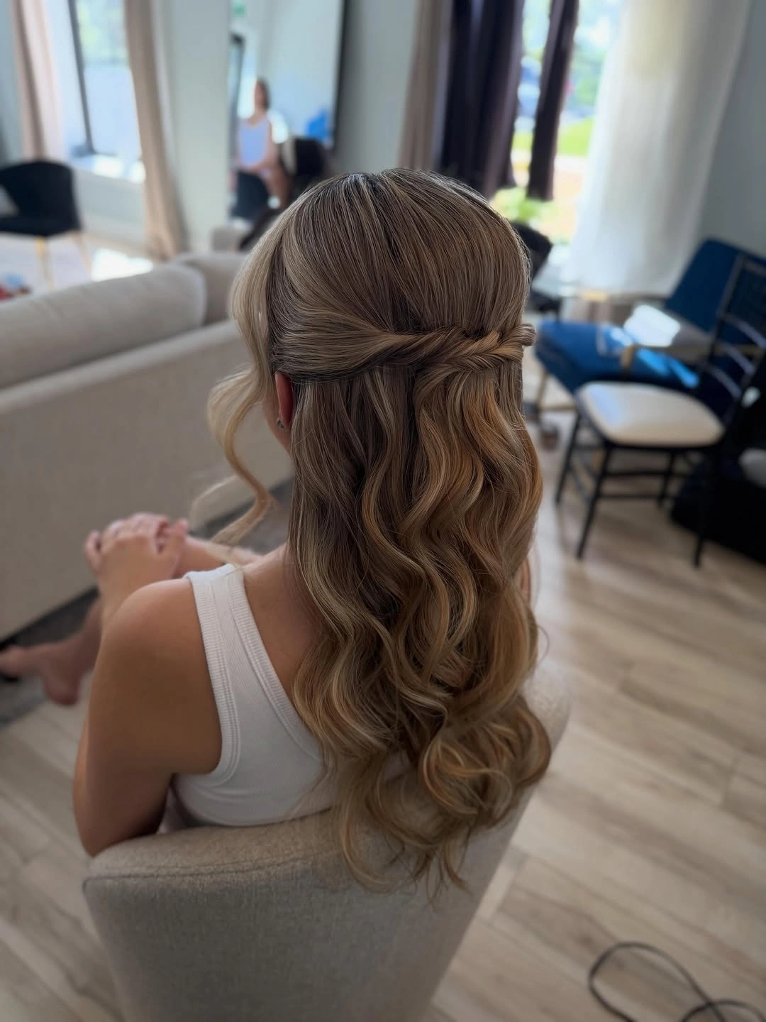 bridesmaid hairstyling Twisted Half-Up Waves For A Classic Party Dress