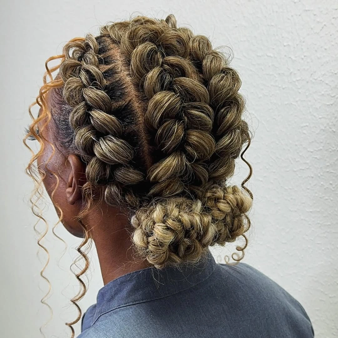 butterfly braids hairstyle Blonde Butterfly Braids Gathered Into Low Buns