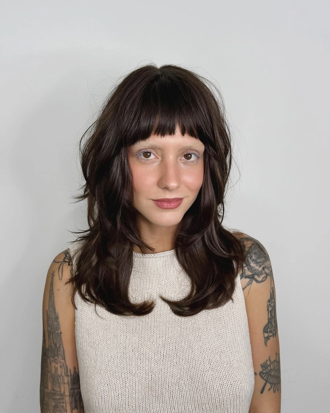 choppy medium layered hair Dark Layered Cut With Mini Fringe