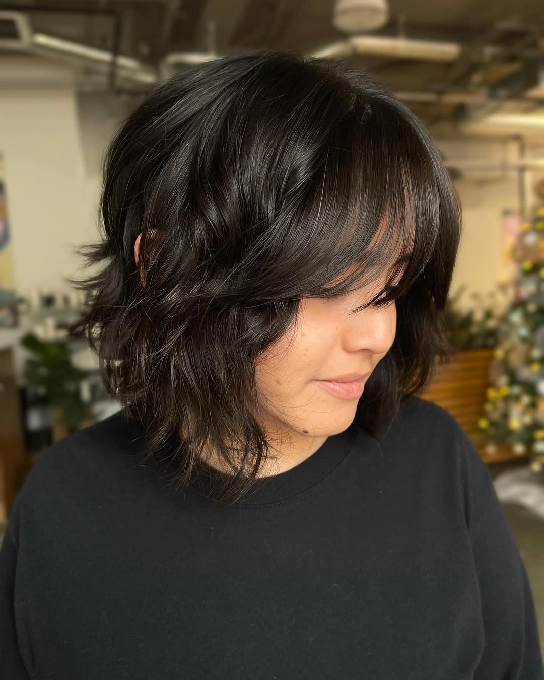 choppy medium layered hair Black Wavy Bob With Soft Fringe