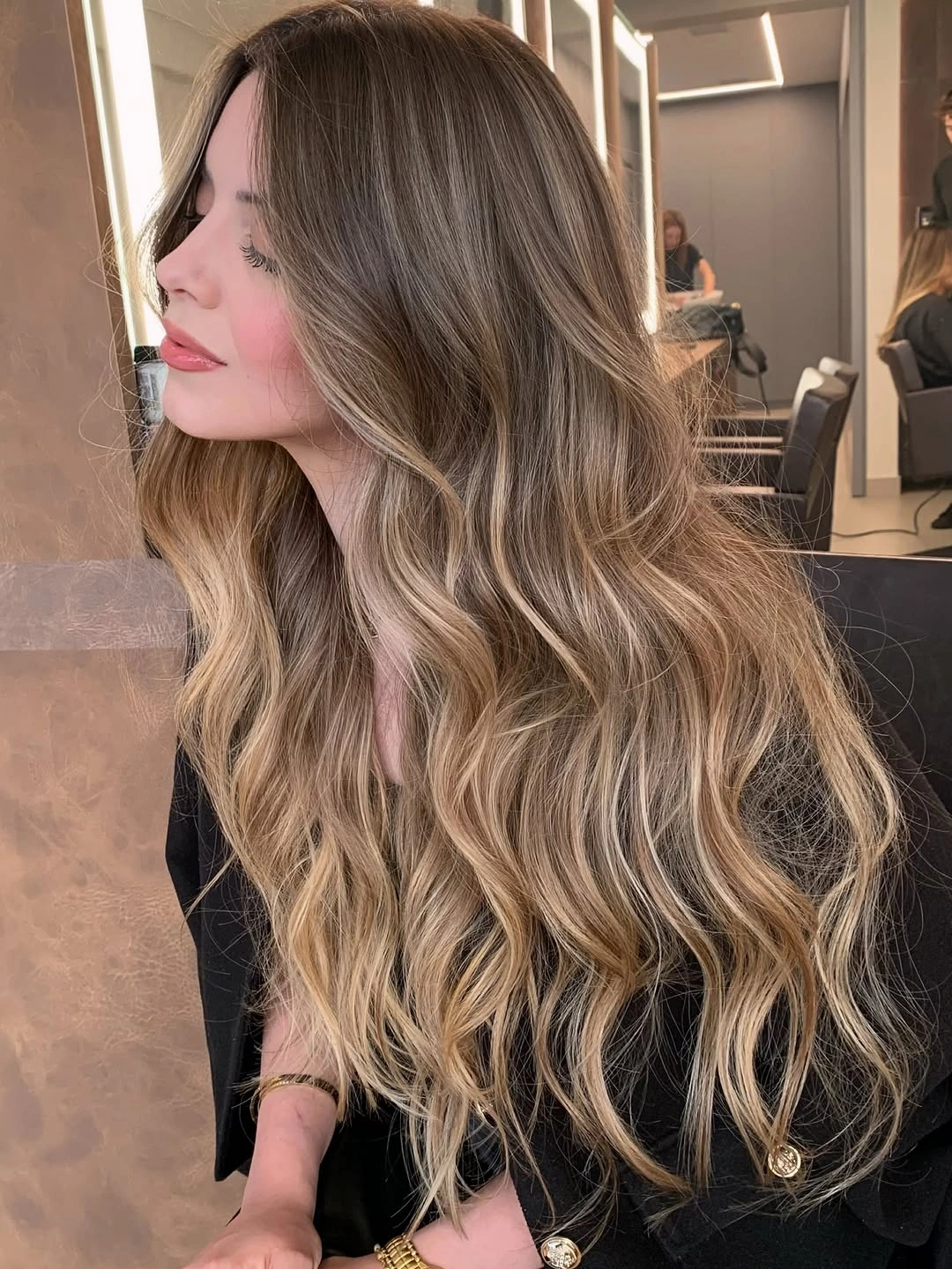 dirty blonde hair color Long Bronde Waves With A Salon-Girl Finish