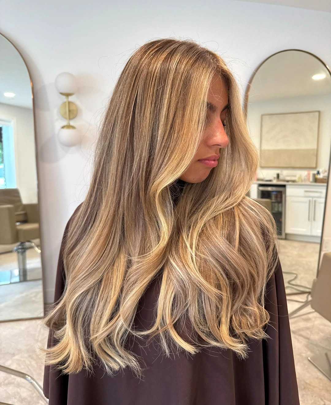 dirty blonde hair color Golden Beige Blowout With Long Layers