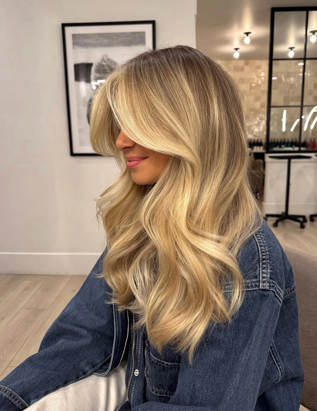 dirty blonde hair color Golden Curtain Bangs With A Denim Jacket