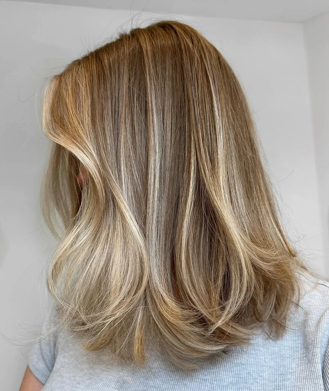 dirty blonde hair color Dimensional Dirty Blonde Lob With Airy Ends