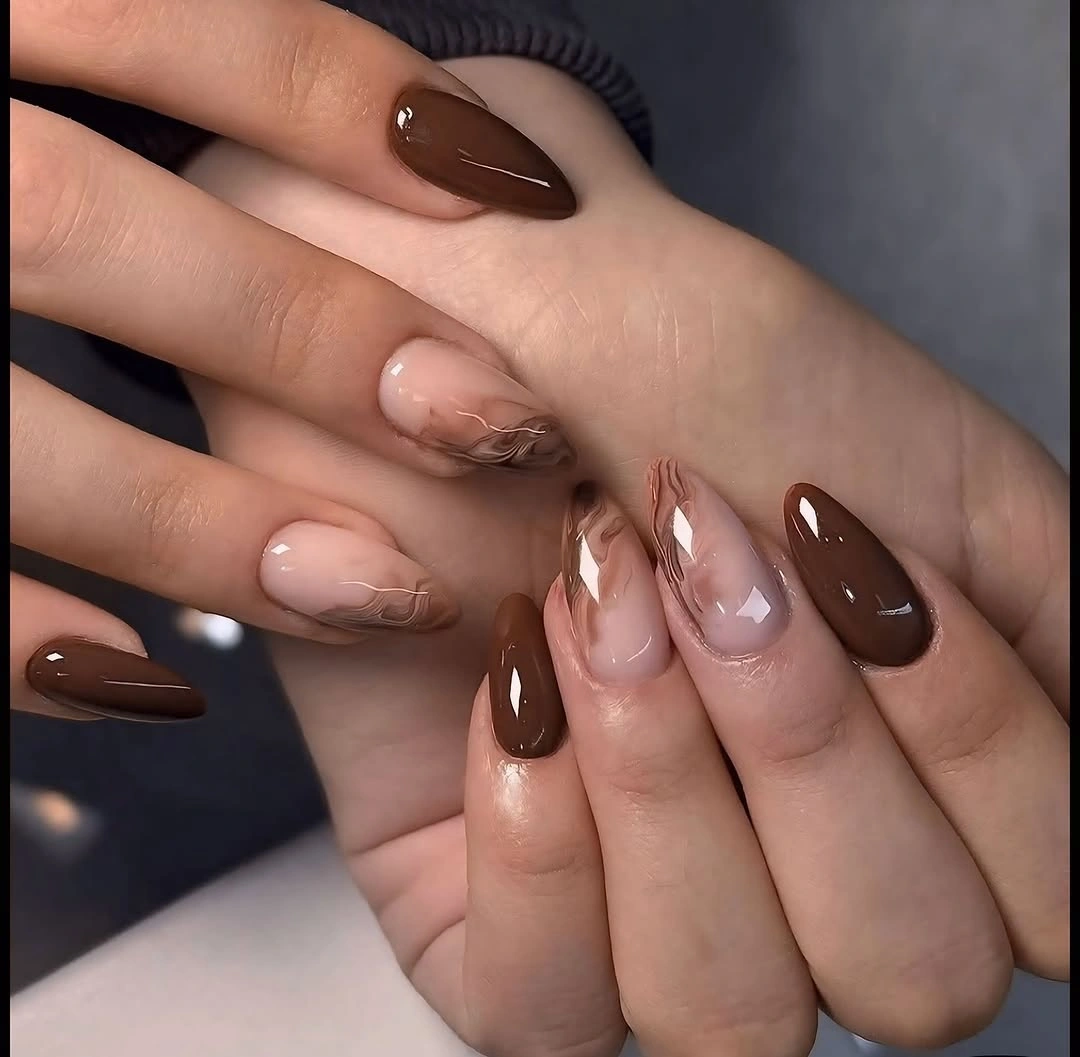 fall almond nails 2026 Chocolate Almond Nails With Soft Marble Accents