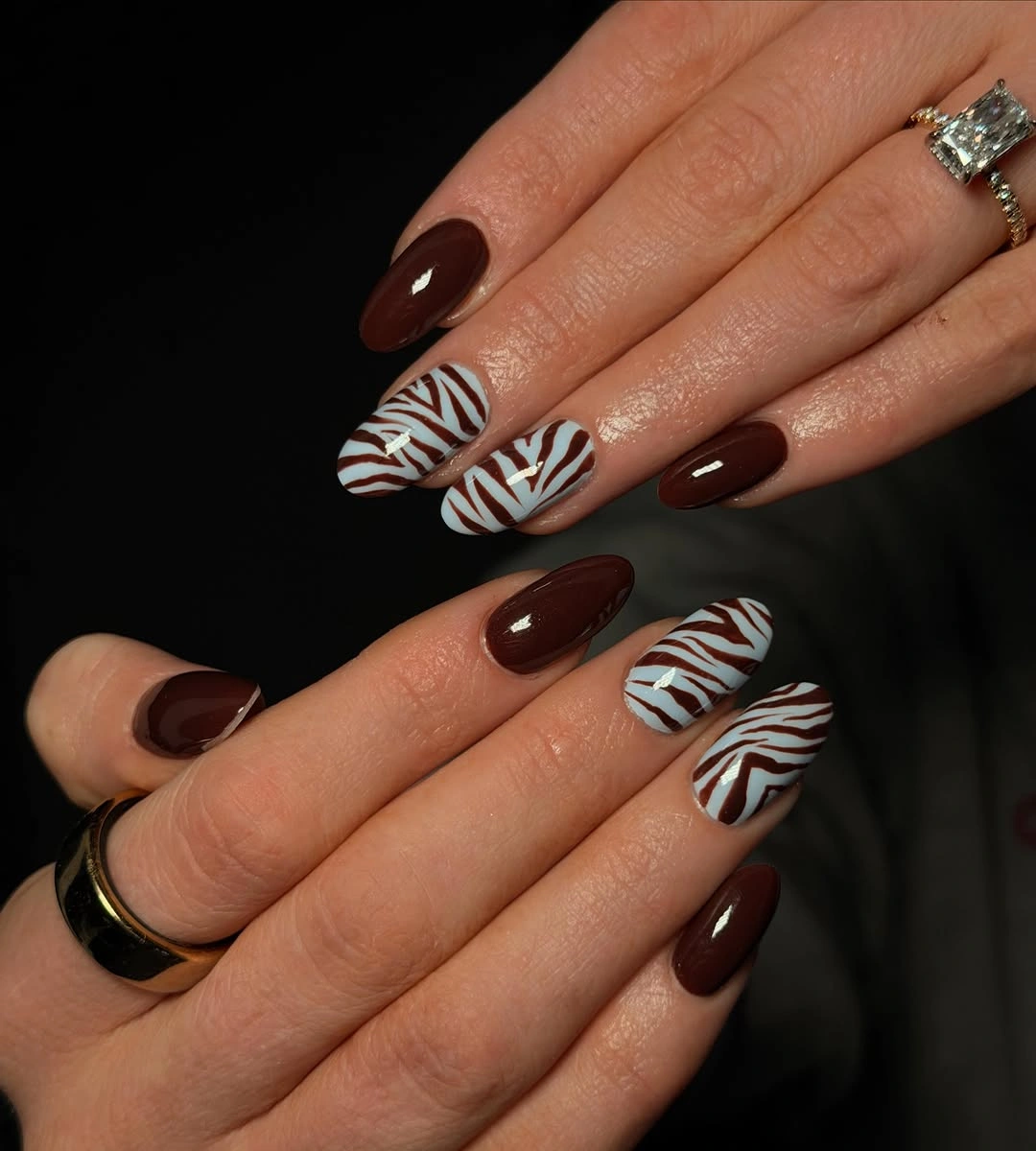 fall almond nails 2026 Brown Almond Nails With Zebra Accent Stripes