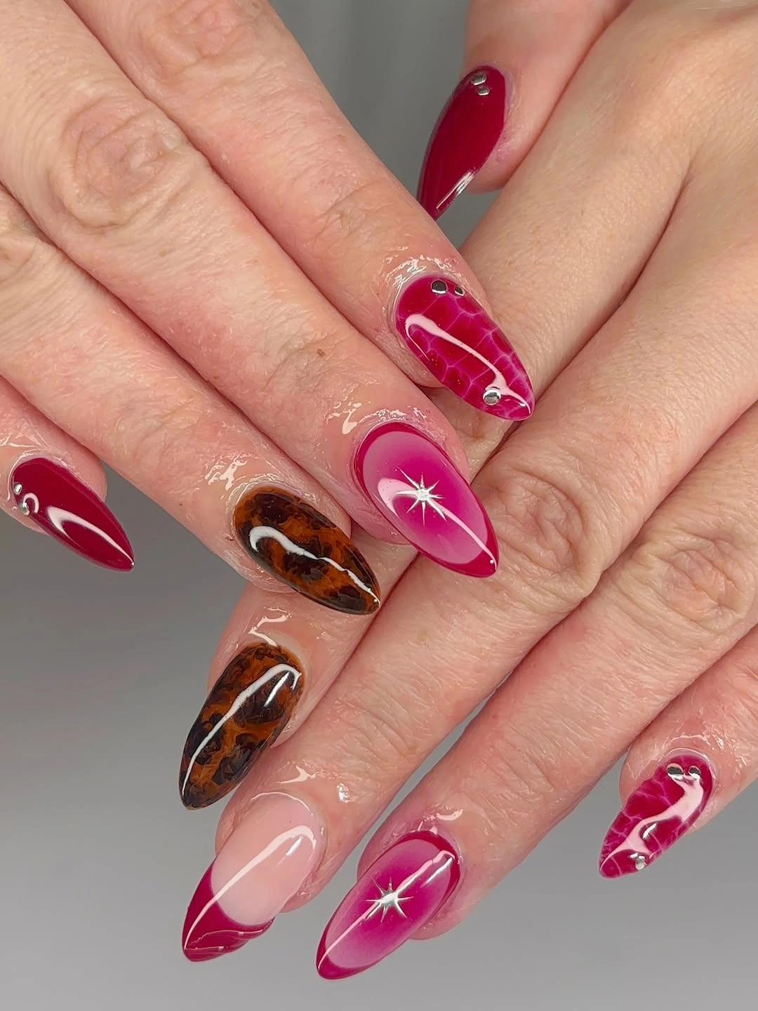 fall almond nails 2026 Hot Pink Almond Nails With Tortoise Contrast