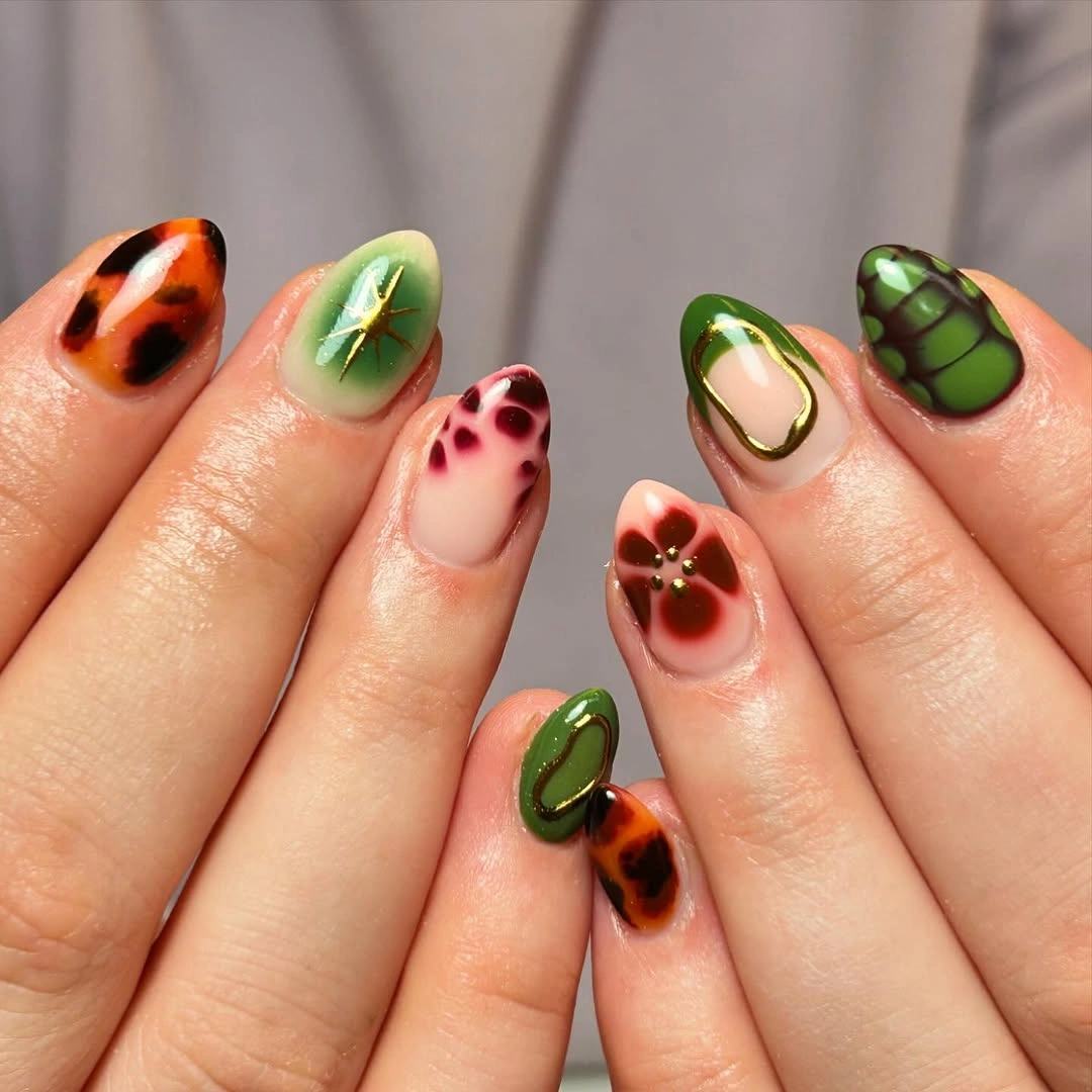 fall almond nails 2026 Green Tortoise Almond Nails With Mixed Motifs