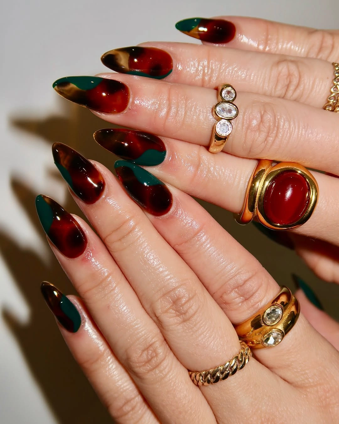 fall almond nails 2026 Green Tortoise Almond Nails With Red Centers