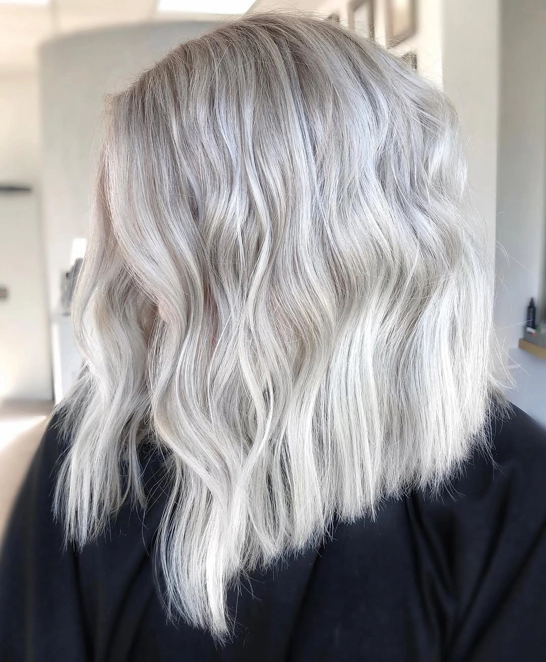 Fall blonde hair colour 2026 Icy Platinum on a Blunt Wavy Bob