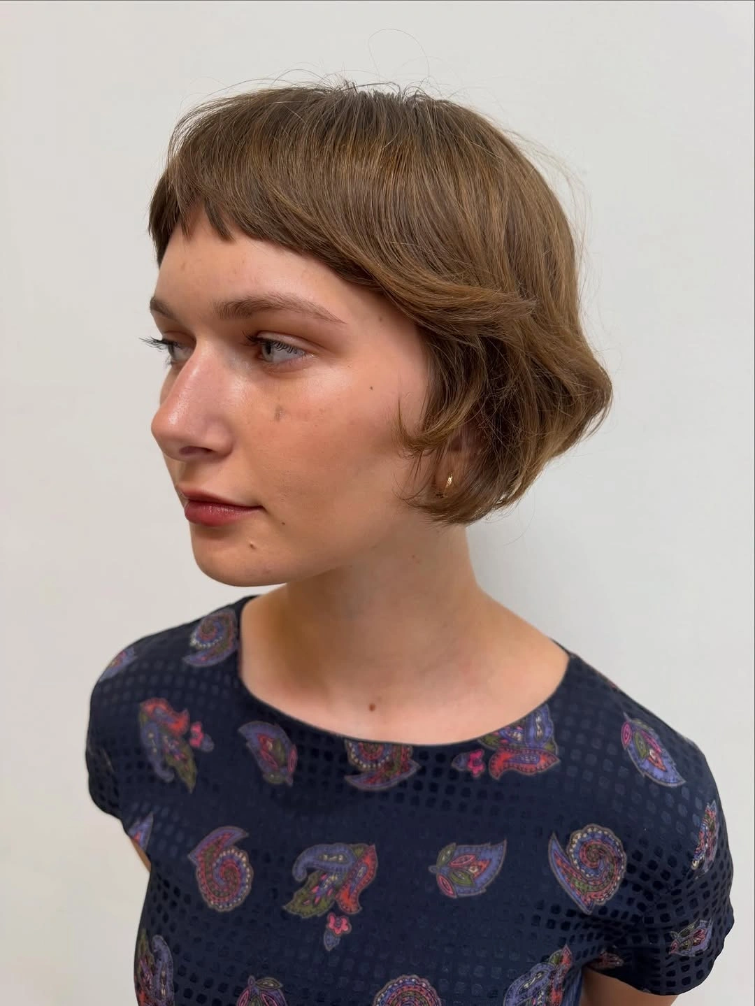 fall bob haircut ideas 2026 Vintage Mini Bob With Wispy Baby Bangs