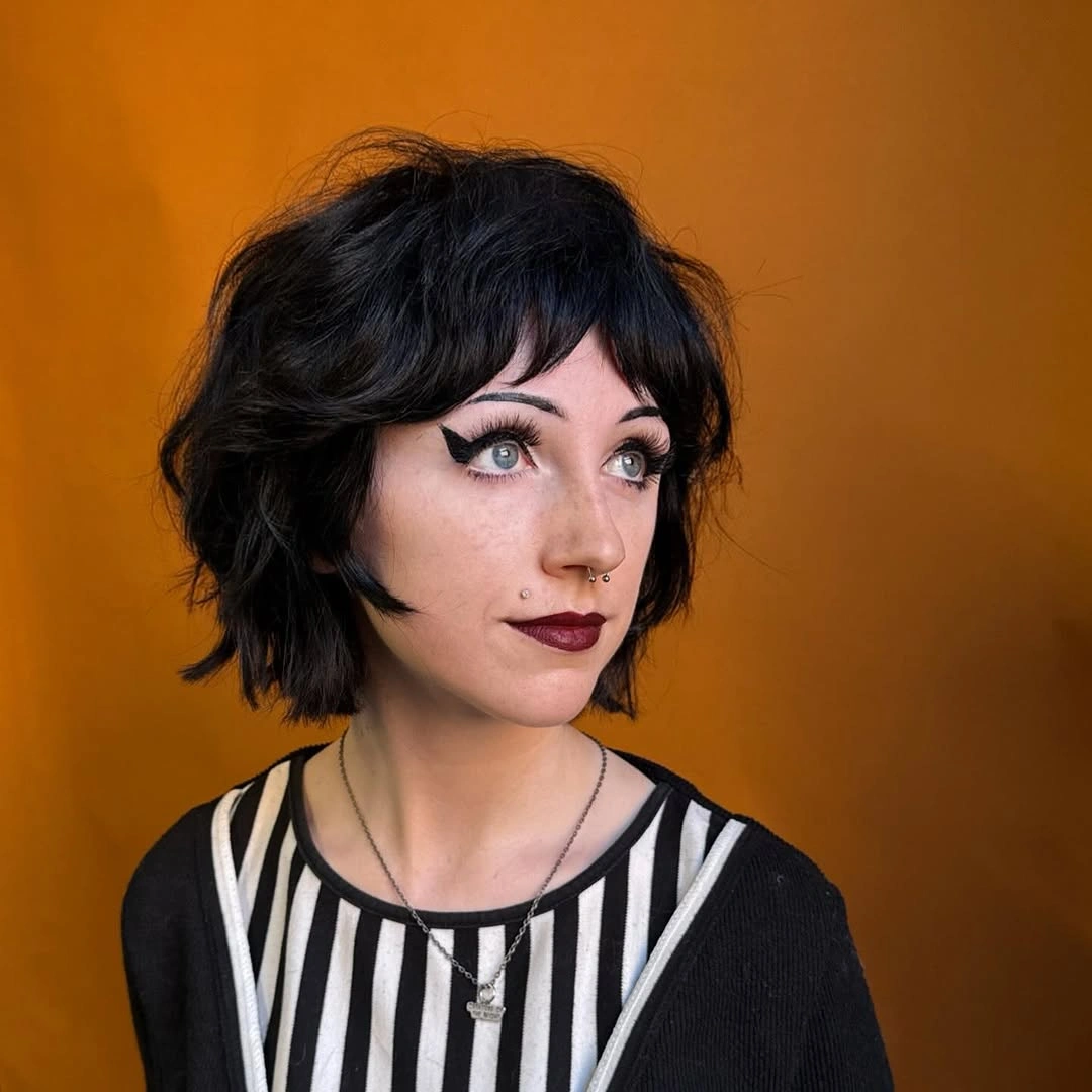 fall bob haircut ideas 2026 Shaggy Black Bob With Piecey Bangs