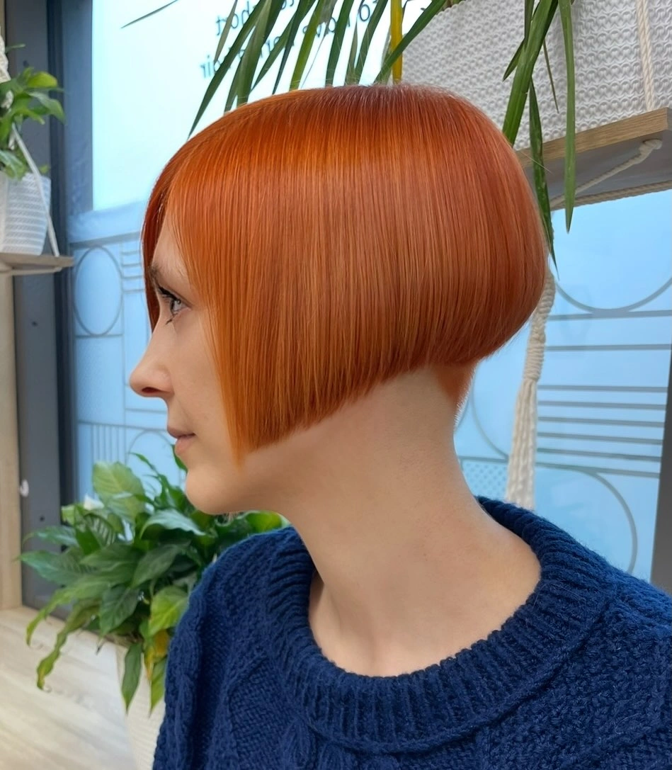 fall bob haircut ideas 2026 Copper Stacked Bob With Sculpted Volume