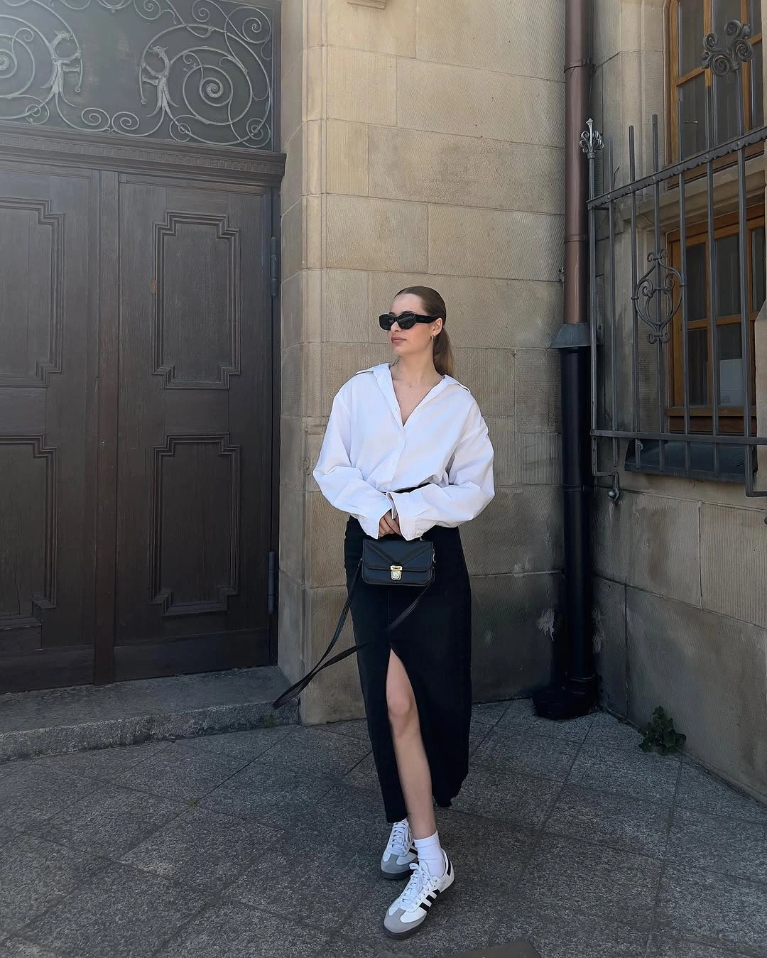 fall classy outfits women 2026 + White Shirt and Black Slit Skirt With Sneakers
