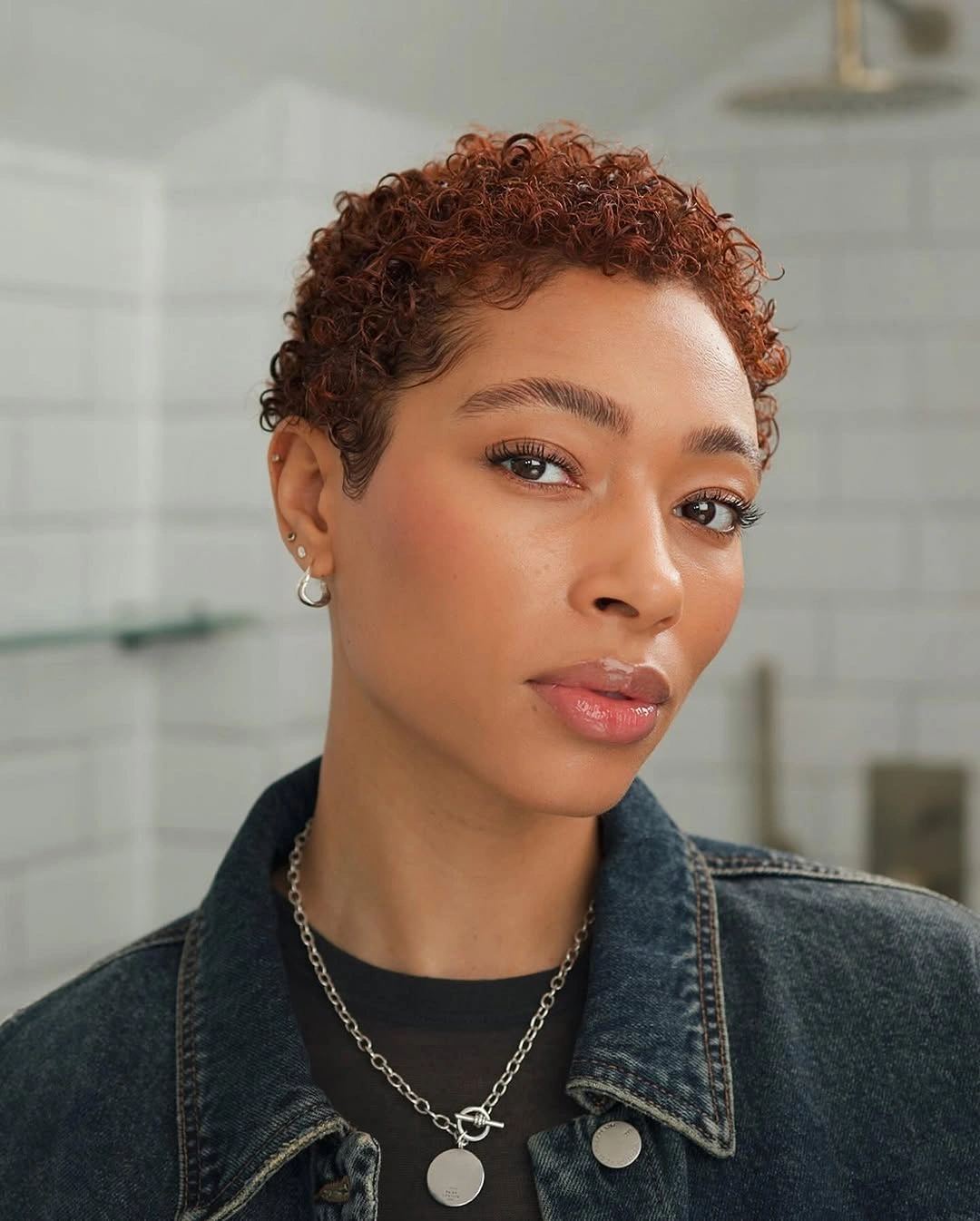 fall hair colors for black women 2026 Spiced Copper Pixie With Denim Jacket Cool
