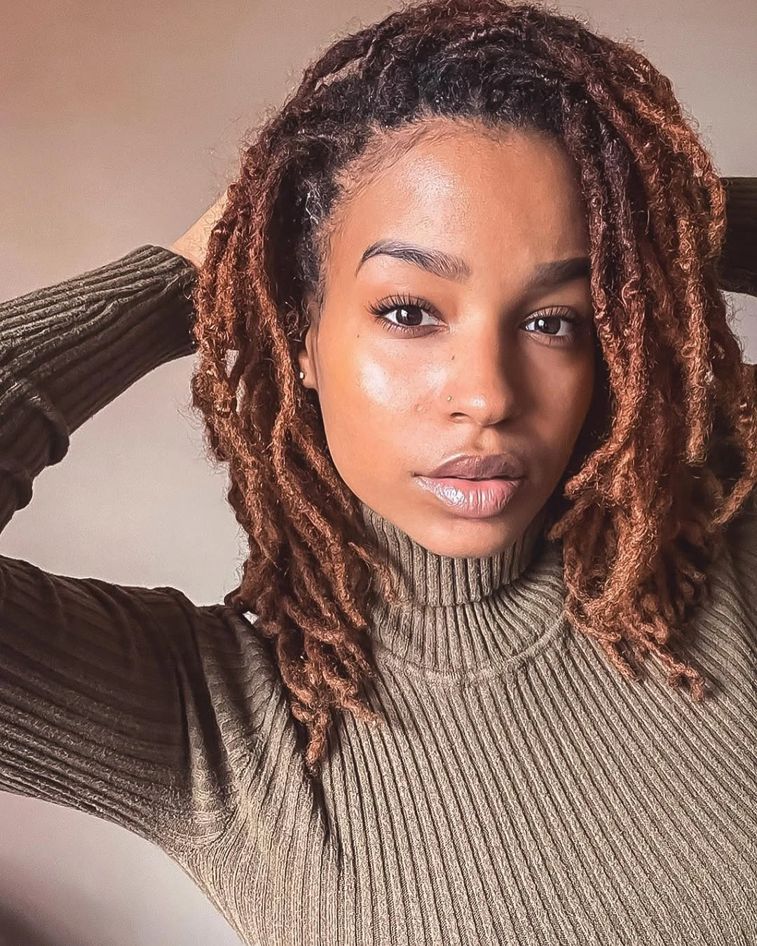 fall hair colors for black women 2026 Copper Brown Locs With Earthy Knit Texture