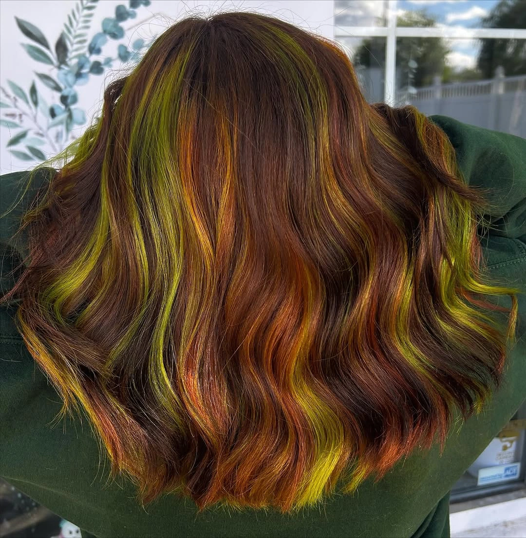 Fall hair colour ideas 2026 Chestnut Waves with Electric Moss Ribbons